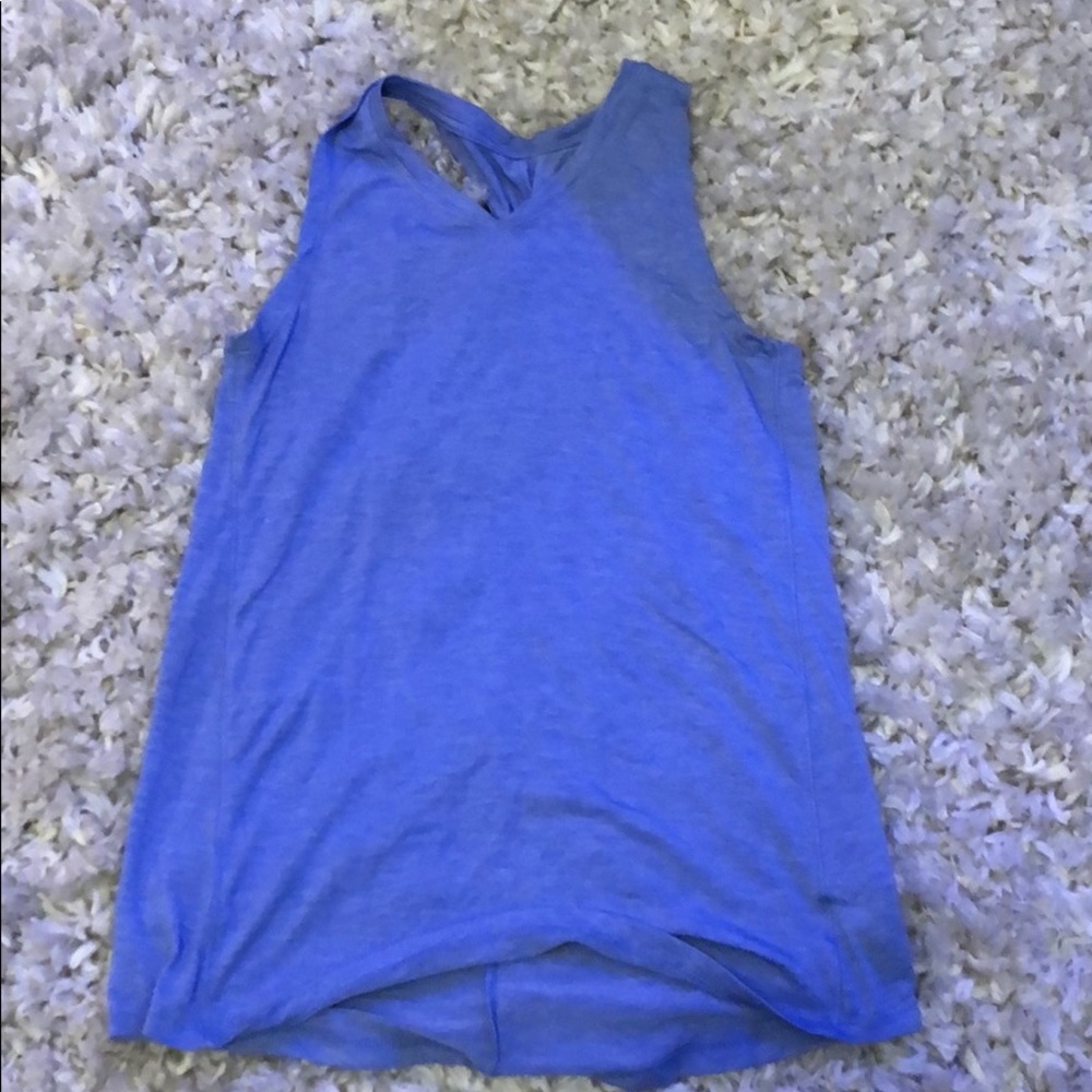 Athletic purple or blue tank top.